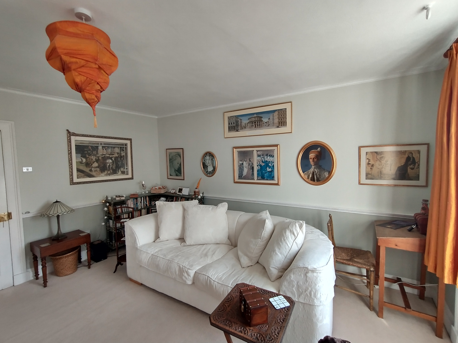View of living room with chair and chaise longue. There is also a large comfortable sofa just out of sight